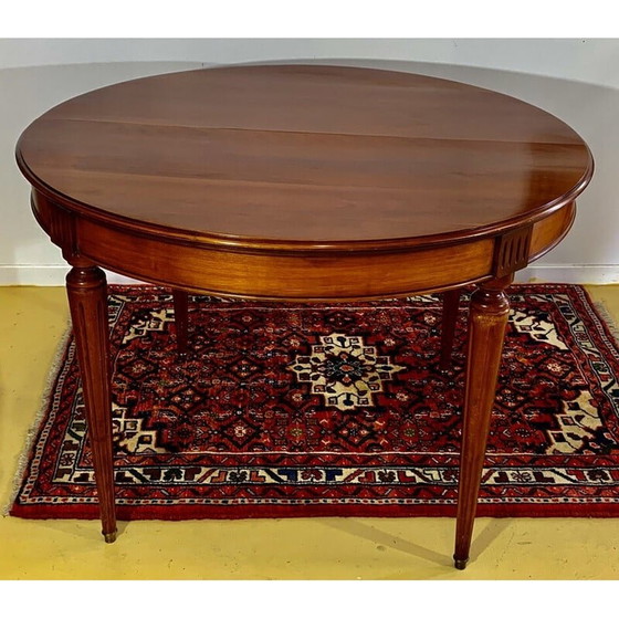 Image 1 of Vintage ronde tafel in kersenhout met 2 verlengstukken