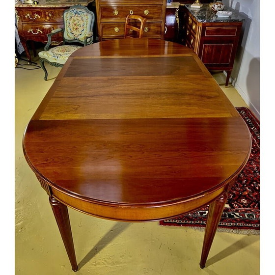 Image 1 of Vintage ronde tafel in kersenhout met 2 verlengstukken