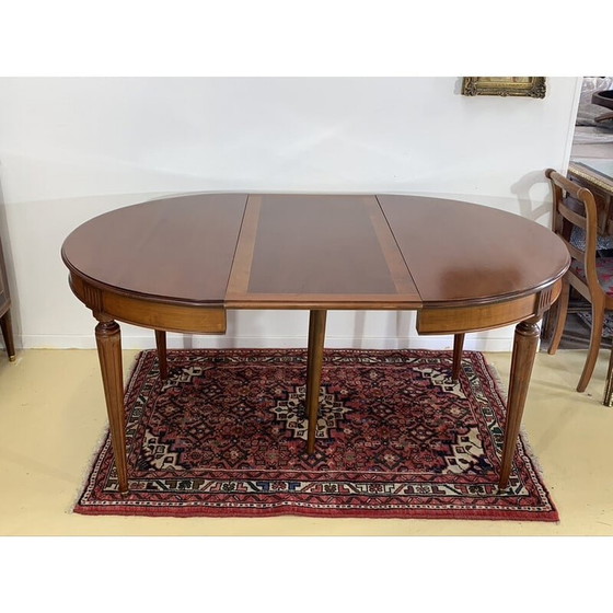 Image 1 of Vintage ronde tafel in kersenhout met 2 verlengstukken