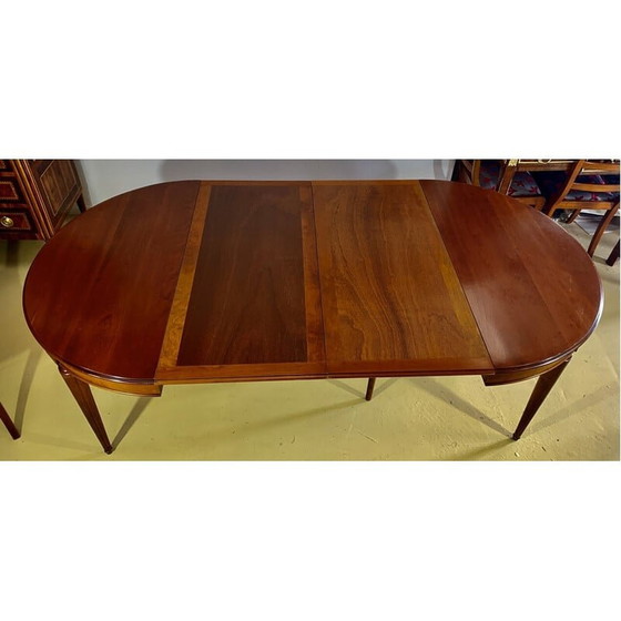 Image 1 of Vintage ronde tafel in kersenhout met 2 verlengstukken