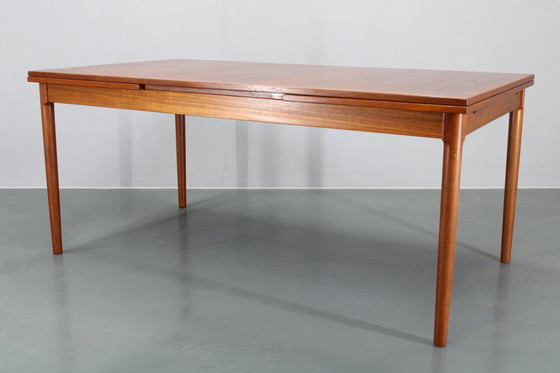 Image 1 of 1960S Kai Winding grote uitschuifbare teakhouten eettafel model 16, Denemarken