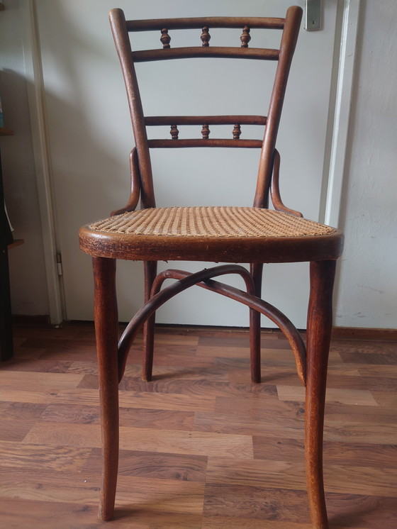 Image 1 of Antique Wooden chair, handwoven webbing