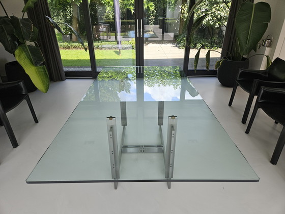 Image 1 of Moderne eettafel glas met geborsteld RVS-nderstel