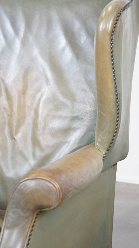 Image 1 of Groene Rundleren Oorfauteuil