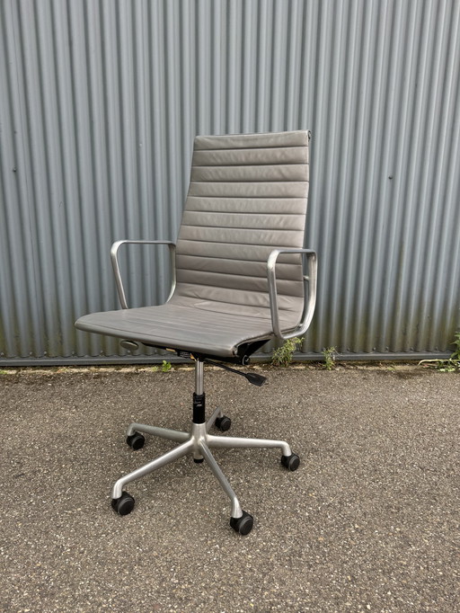 Vintage Vitra Eames EA119 bureaustoel grijs leder