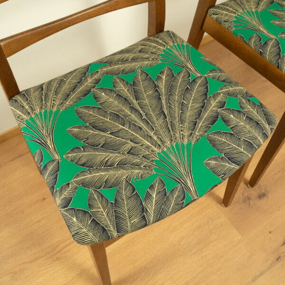 Image 1 of 2x 1960 Teakhouten stoelen van Welzel: Groene hoes met palmboompatroon