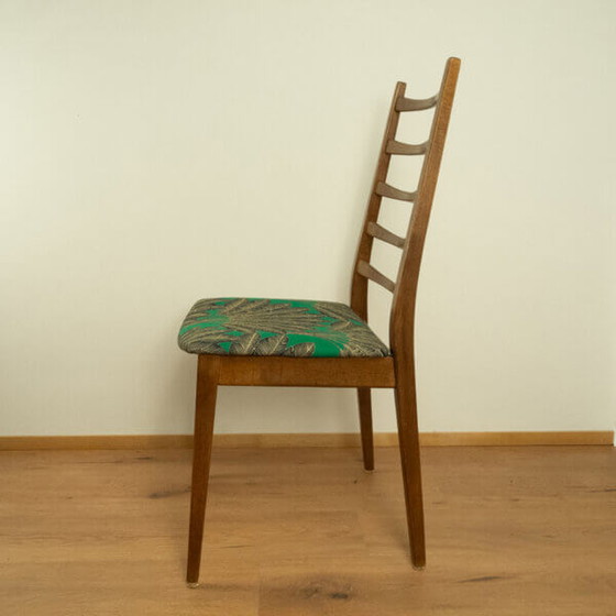 Image 1 of 2x 1960 Teakhouten stoelen van Welzel: Groene hoes met palmboompatroon