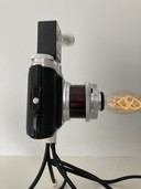 Decoratieve cameralamp op statief