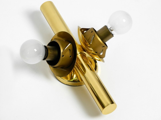 Image 1 of Paar prachtige en zeldzame 1960S Kaiser messing wandlampen met twee gouden glazen bollen