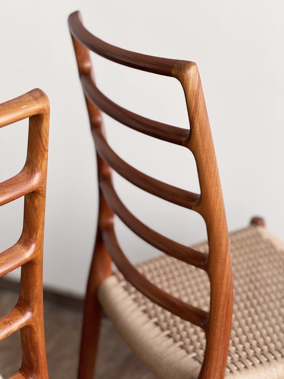 Image 1 of Mid Century Deense Model 82 eetkamerstoelen in teak van Niels O. Møller voor J.L Møllers Møbelfabrik, 1950, set van 4