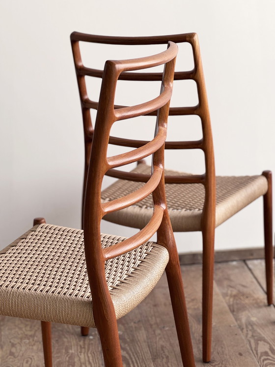 Image 1 of Mid Century Deense Model 82 eetkamerstoelen in teak van Niels O. Møller voor J.L Møllers Møbelfabrik, 1950, set van 4