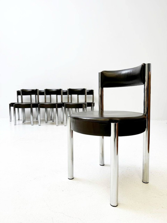 Image 1 of Victoria meubelset: uitschuifbare tafel en 8 Iconic stoelen van chroom en leer, jaren 1960