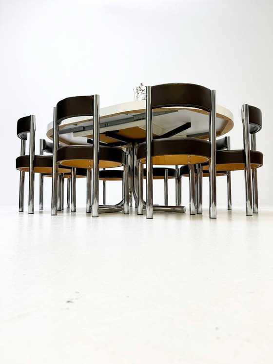 Image 1 of Victoria meubelset: uitschuifbare tafel en 8 Iconic stoelen van chroom en leer, jaren 1960