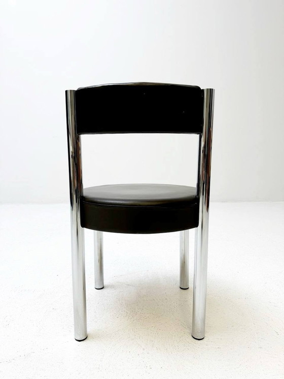 Image 1 of Victoria meubelset: uitschuifbare tafel en 8 Iconic stoelen van chroom en leer, jaren 1960