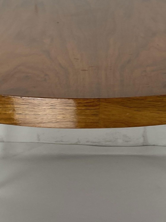 Image 1 of Italiaanse ronde tafel met conische koperen poten, 1950S