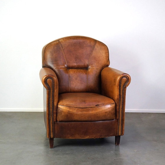 Image 1 of Schapenleren fauteuil met een stoere look