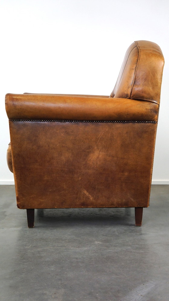 Image 1 of Schapenleren fauteuil met een stoere look