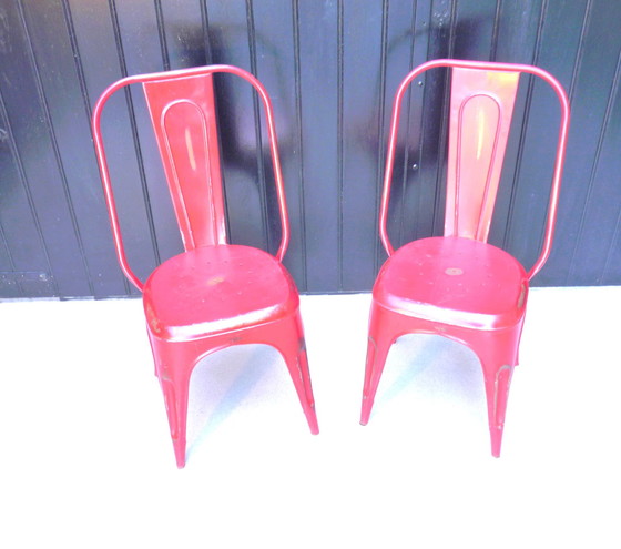 Image 1 of 2x Vintage stapelstoelen in rood plaatstaal