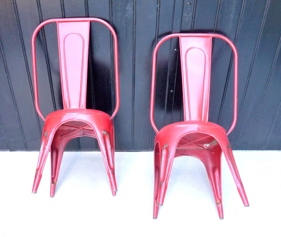 Image 1 of 2x Vintage stapelstoelen in rood plaatstaal