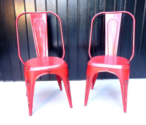 Image 1 of 2x Vintage stapelstoelen in rood plaatstaal