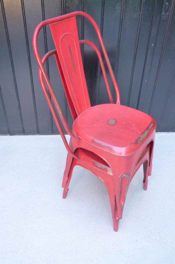 Image 1 of 2x Vintage stapelstoelen in rood plaatstaal