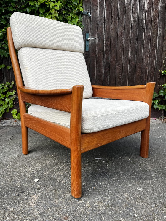 Image 1 of dyrlund teakhouten fauteuil met voetenbankje