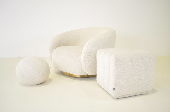 Image 1 of Eichholtz swivel chair + stool + kussen