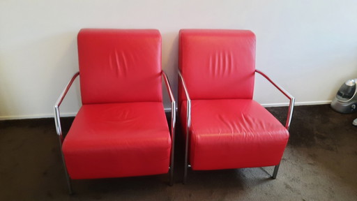 2 fauteuils van rood leer