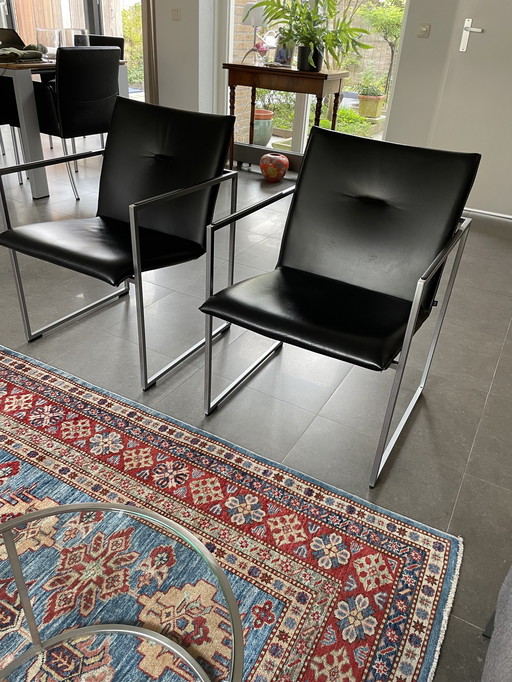 2x Arco frame fauteuils