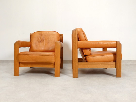 Image 1 of 2 oak armchairs in cognac leather by Skilla 