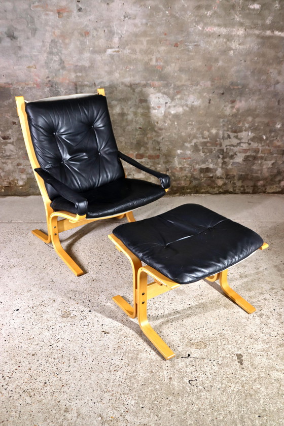 Image 1 of Ingmar Relling fauteuil en ottoman voor Ekornes 