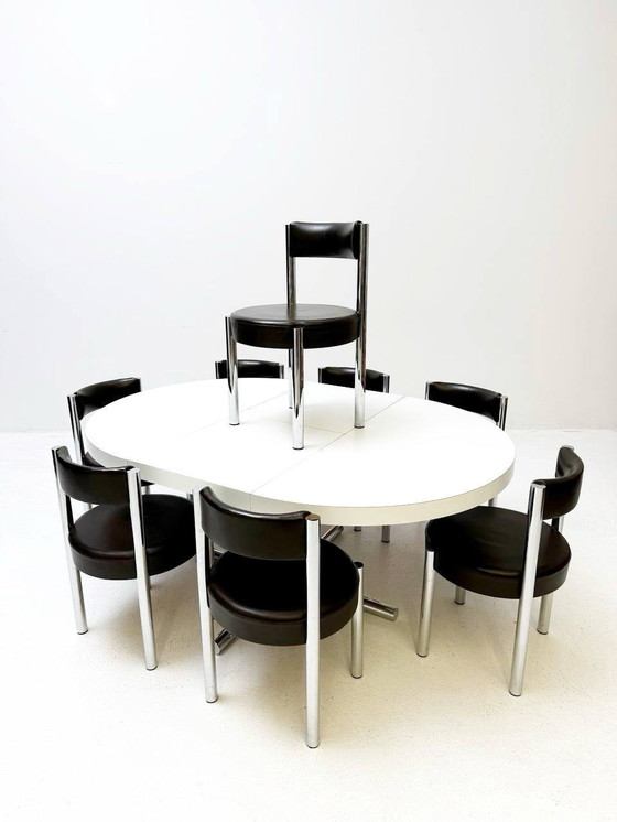 Image 1 of Victoria meubels: uitschuifbare tafel en 8 Iconische stoelen van chroom en leer, jaren 1960