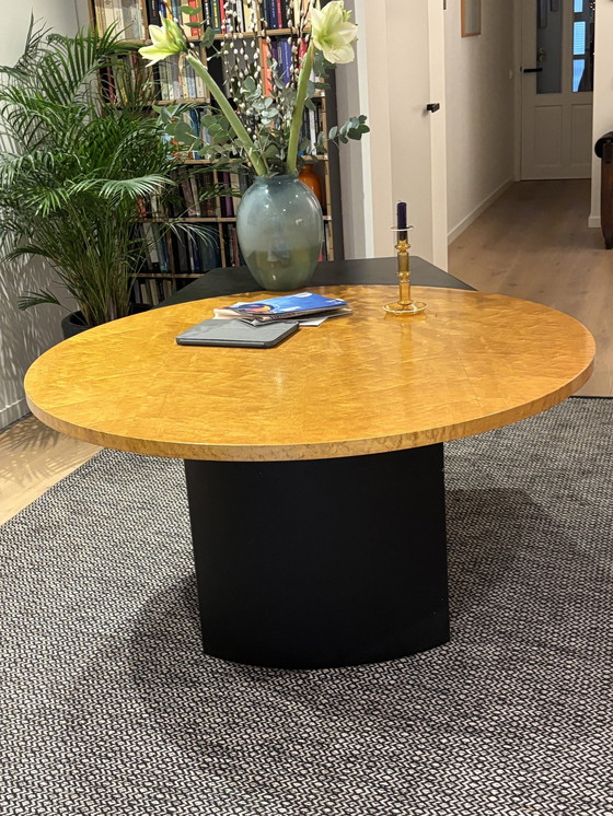 Image 1 of Design jaren zeventig Eetkamertafel Essen Rond Met Zwarte Kunststof Ovalen Uitbreidin