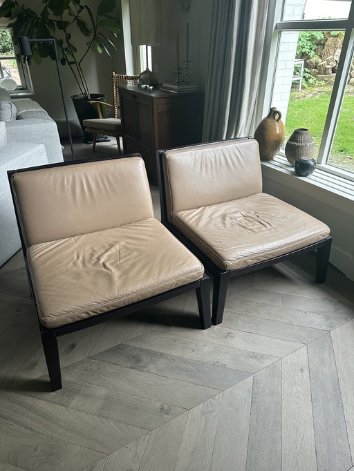 2x Leren lounge chairs