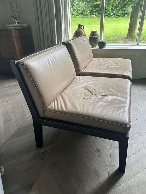 2x Leren lounge chairs