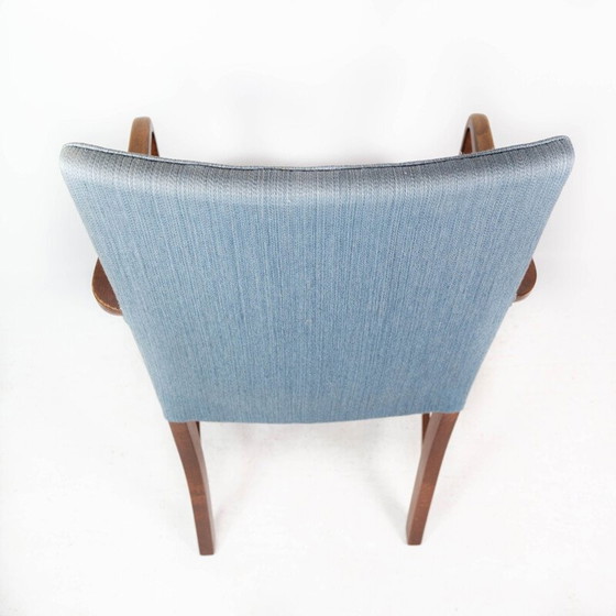 Image 1 of Vintage fauteuil in mahonie en bekleed met lichtblauwe stof van Fritz Hansen