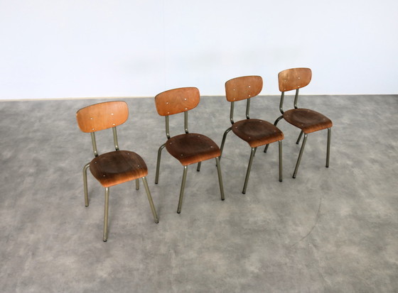 Image 1 of 8X Vintage Industriële Tubax Stoelen