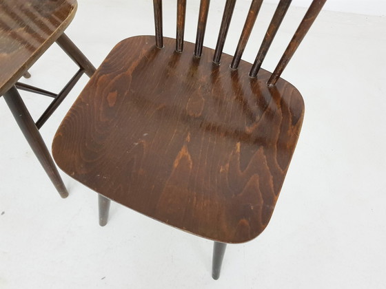 Image 1 of Drie vintage spijlenstoelen