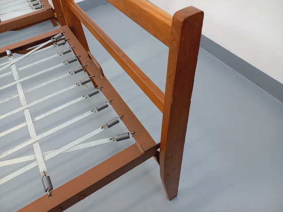 Image 1 of Paar oude eiken en metalen stapelbedden uit de jaren 60