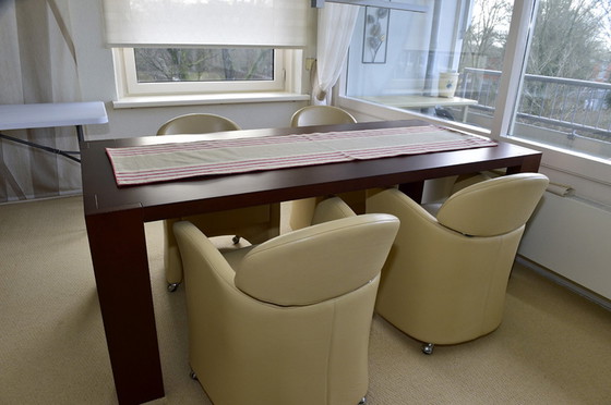 Image 1 of 4 Frighetto leren eetkamerstoelen op wielen en verstelbare rugleuning