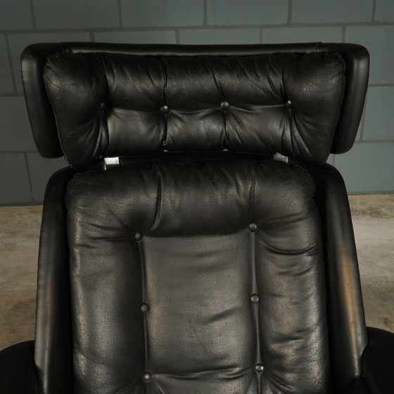 Image 1 of Vintage zwarte draaifauteuil – skaileder – jaren 60