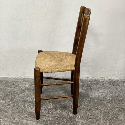 Vintage Bauche N°19 stoel in massief hout en stro van Charlotte Perriand