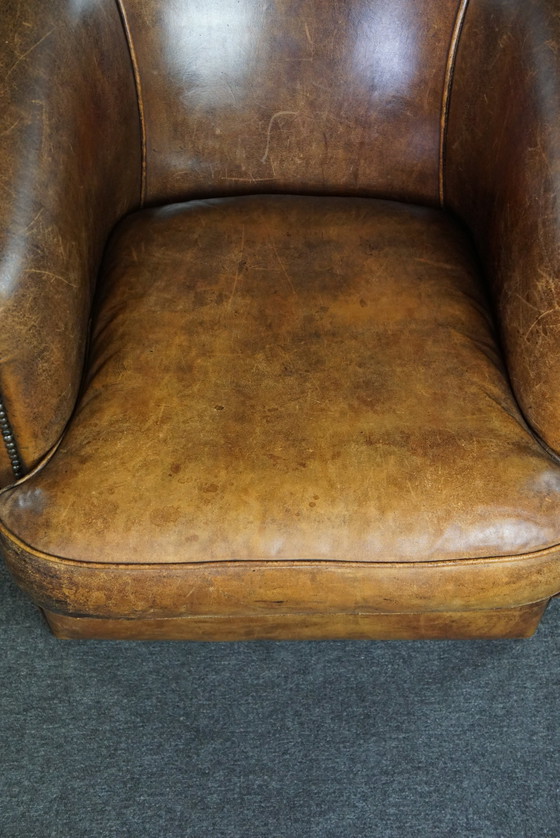 Image 1 of Clubfauteuil met patina, gemaakt van schapenleer