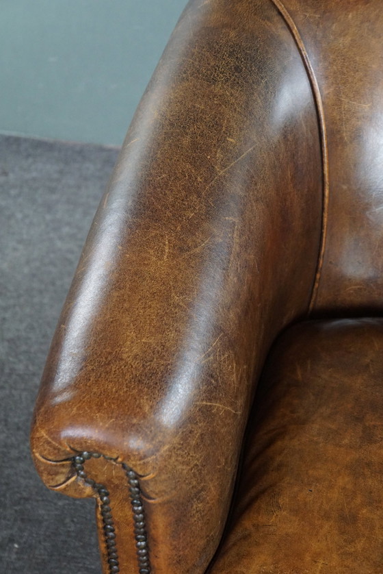 Image 1 of Clubfauteuil met patina, gemaakt van schapenleer