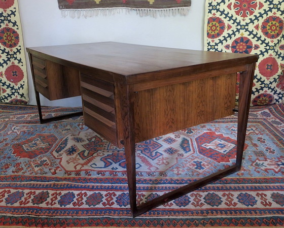 Image 1 of Kai Kristiansen Voor Feldballes Mobelfabrik Model 70 Rozenhouten bureau op sledeonderstel, 1960S