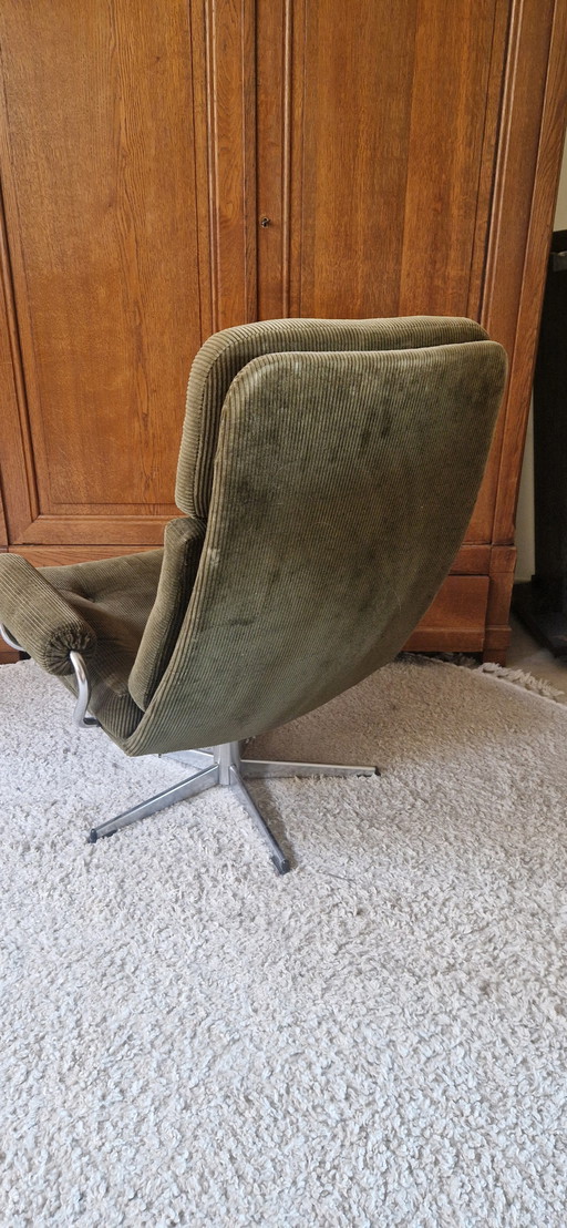 Vintage groene relax draai fauteuil