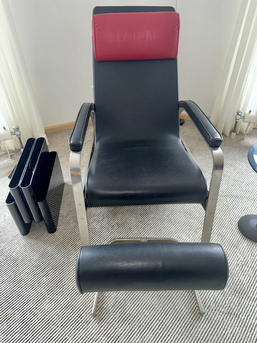 Tecta fauteuil met hocker, lamp, lectuurbak + tafeltje