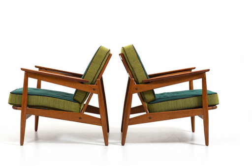 2x Deense fauteuils in eiken en teak