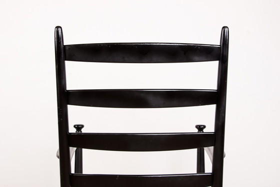 Image 1 of Een schommelstoel in gelakt teakhout en stof Model 218 van Thomas Harlev voor Farstrup Savvaek 1960.