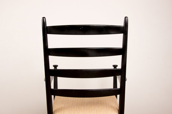 Image 1 of Een schommelstoel in gelakt teakhout en stof Model 218 van Thomas Harlev voor Farstrup Savvaek 1960.